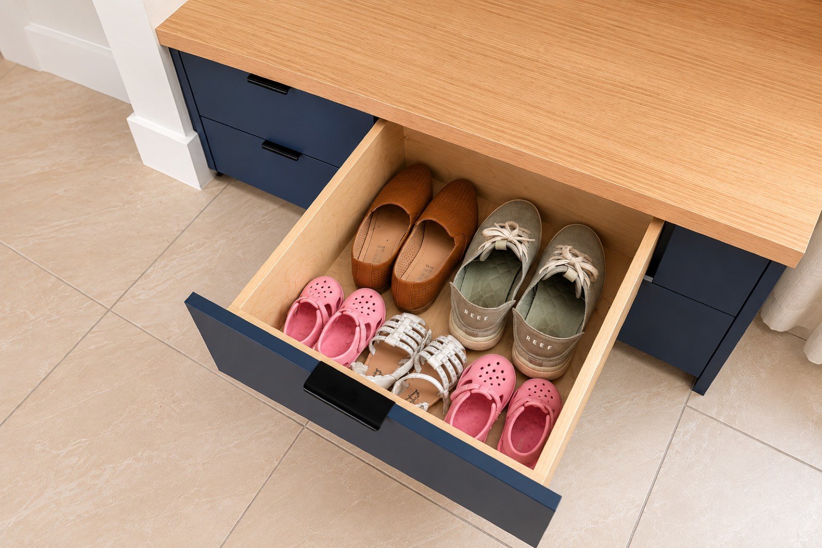 Mudroom shoe storage drawer by Coastal Precision CNC